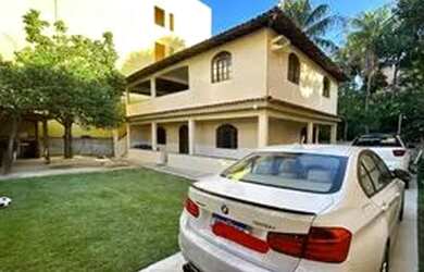 Imagem: A casa possui 3 Dormitórios, 3 Vagas na garagem e está localizado