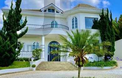 Imagem: A casa em condomínio possui 5 Dormitórios, 5 Banheiros, 5