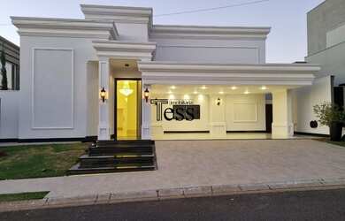 Imagem: A casa em condomínio possui 3 Dormitórios, 5 Banheiros, 630m²