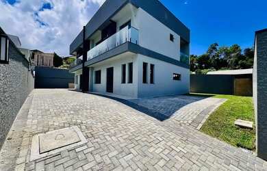 Imagem: A casa em condomínio possui 3 Dormitórios, 4 Banheiros, 2