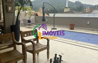 Imagem: A casa em condomínio possui 4 Dormitórios, 4 Banheiros, 4