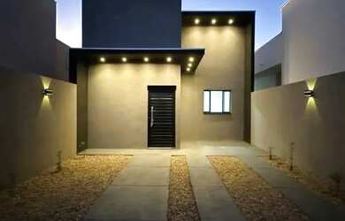 Imagem: A casa possui 3 Dormitórios, 2 Banheiros, 2 Vagas na garagem