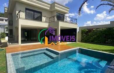 Imagem: A casa em condomínio possui 4 Dormitórios, 5 Banheiros, 4