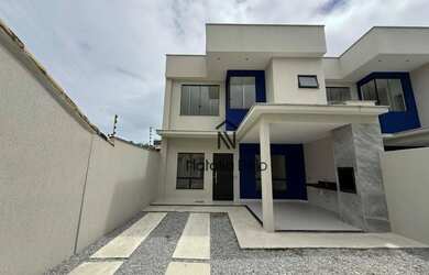 Imagem: A casa possui 3 Dormitórios, 4 Banheiros, 3 Vagas na garagem