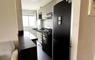 Imagem: O apartamento possui 2 Dormitórios, 1 Banheiro, 1 Vaga na garagem