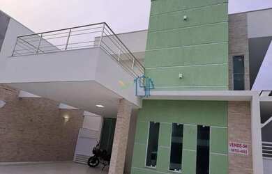 Imagem: A casa possui 4 Dormitórios, 2 Banheiros, 4 Vagas na garagem