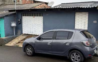 Imagem: A casa possui 3 Dormitórios, 2 Banheiros, 2 Vagas na garagem