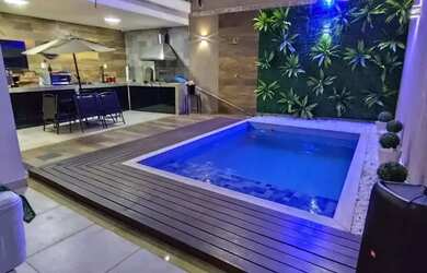 Imagem: A casa possui 3 Dormitórios, 3 Banheiros, 2 Vagas na garagem