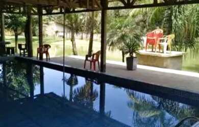 Imagem: A casa possui 3 Dormitórios, 4 Banheiros, 5 Vagas na garagem