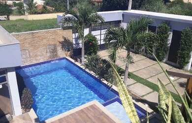 Imagem: A casa em condomínio possui 4 Dormitórios, 4 Banheiros, 2