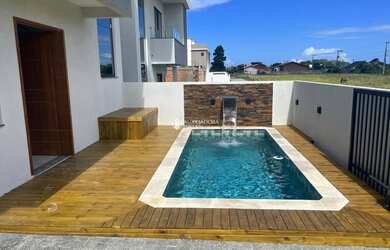 Imagem: A casa possui 3 Dormitórios, 1 Banheiro, 1 Vaga na garagem