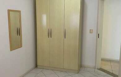 Imagem 12: Apto 01 dormitório com cama de casal, 02 criados-mudos, armário e ventilador...