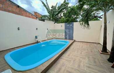 Imagem: A casa possui 3 Dormitórios e 2 Banheiros e está localizado