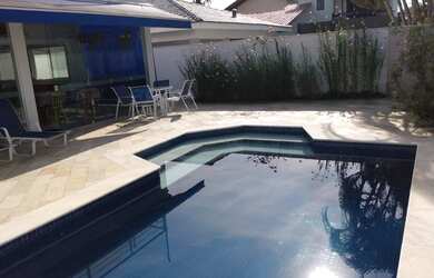 Imagem: A casa em condomínio possui 5 Dormitórios, 5 Banheiros, 4