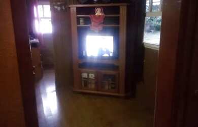 Imagem: A casa possui 2 Dormitórios, 1 Banheiro, 1 Vaga na garagem