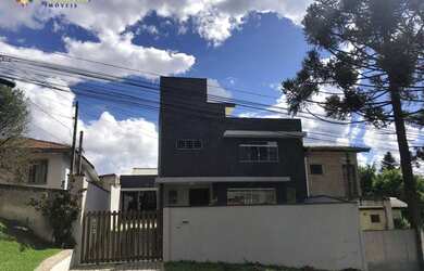 Imagem: A casa possui 3 Dormitórios, 3 Banheiros, 3 Vagas na garagem