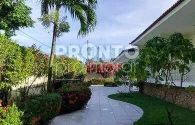 Imagem: A casa possui 4 Dormitórios, 2 Banheiros, 5 Vagas na garagem