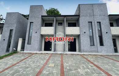 Imagem: A casa em condomínio possui 2 Dormitórios, 3 Banheiros, 2