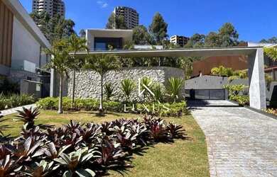 Imagem: A casa em condomínio possui 4 Dormitórios, 5 Banheiros, 4