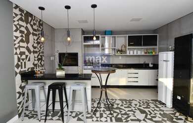 Imagem: A casa possui 3 Dormitórios, 3 Banheiros, 5 Vagas na garagem