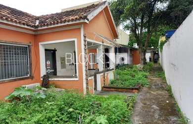 Imagem: A casa possui 3 Banheiros, 4 Vagas na garagem, 311m² de Área