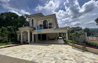 Imagem: A casa em condomínio possui 5 Dormitórios, 5 Banheiros, 5