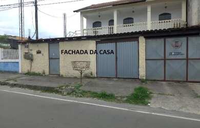 Imagem: A casa possui 5 Dormitórios, 2 Banheiros, 2 Vagas na garagem