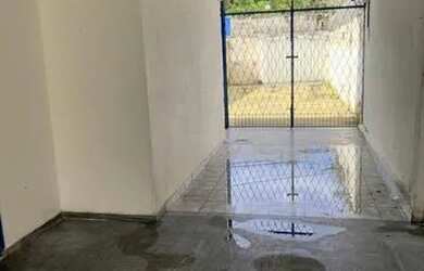 Imagem: A casa possui 3 Dormitórios, 2 Banheiros, 3 Vagas na garagem