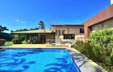 Imagem: A casa em condomínio possui 5 Dormitórios, 5 Banheiros, 700m²