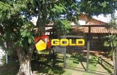 Imagem: A casa possui 3 Dormitórios, 3 Banheiros, 2 Vagas na garagem