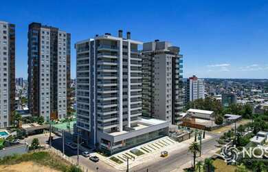 Imagem: O apartamento possui 3 Dormitórios, 2 Banheiros, 2 Vagas na