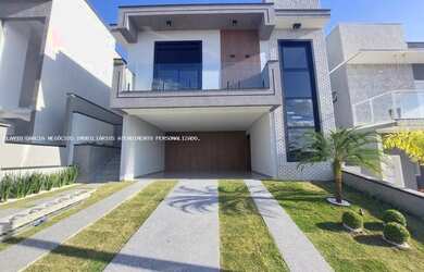 Imagem: A casa possui 3 Dormitórios, 4 Banheiros, 4 Vagas na garagem