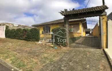 Imagem: A casa possui 4 Dormitórios, 3 Banheiros, 1 Vaga na garagem