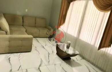 Imagem: A casa possui 4 Dormitórios, 3 Banheiros, 3 Vagas na garagem