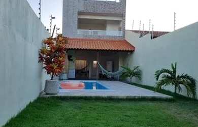 Imagem: A casa possui 3 Dormitórios, 2 Vagas na garagem e está localizado