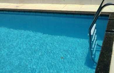 Imagem: A casa possui 2 Dormitórios, 3 Vagas na garagem e está localizado