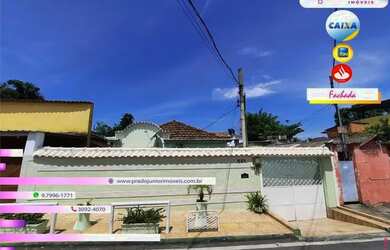 Imagem: A casa possui 3 Dormitórios, 2 Banheiros, 3 Vagas na garagem