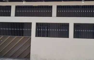 Imagem: A casa possui 3 Dormitórios, 3 Banheiros, 2 Vagas na garagem