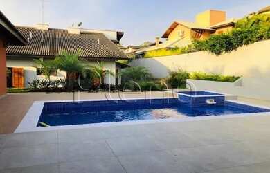 Imagem: A casa em condomínio possui 4 Dormitórios, 5 Banheiros, 5