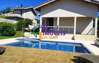 Imagem: A casa em condomínio possui 4 Dormitórios, 5 Banheiros, 4