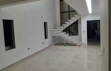 Imagem: A casa possui 3 Dormitórios, 3 Banheiros, 3 Vagas na garagem