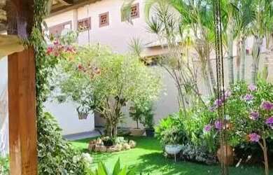 Imagem: A casa possui 3 Dormitórios, 1 Banheiro, 2 Vagas na garagem