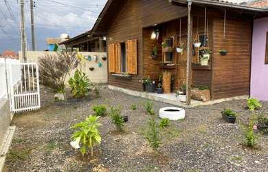 Imagem: A casa possui 4 Dormitórios, 3 Banheiros e está localizado