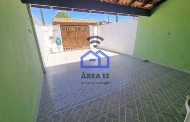 Imagem: A casa possui 3 Dormitórios, 3 Banheiros, 2 Vagas na garagem