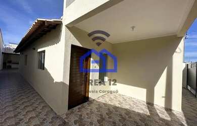 Imagem: A casa possui 3 Dormitórios, 3 Banheiros, 2 Vagas na garagem