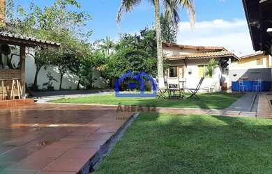 Imagem: A casa possui 5 Dormitórios, 4 Banheiros, 5 Vagas na garagem