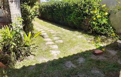 Imagem: A casa possui 2 Dormitórios, 2 Banheiros, 3 Vagas na garagem