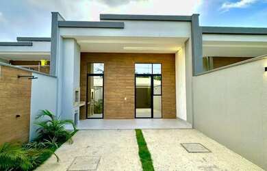 Imagem: A casa possui 3 Dormitórios, 3 Banheiros, 2 Vagas na garagem