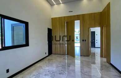 Imagem: A casa possui 3 Dormitórios, 4 Banheiros, 4 Vagas na garagem