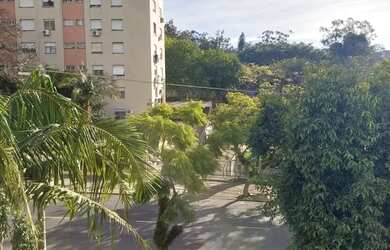 Imagem: O apartamento possui 3 Dormitórios, 1 Banheiro, 1 Vaga na garagem